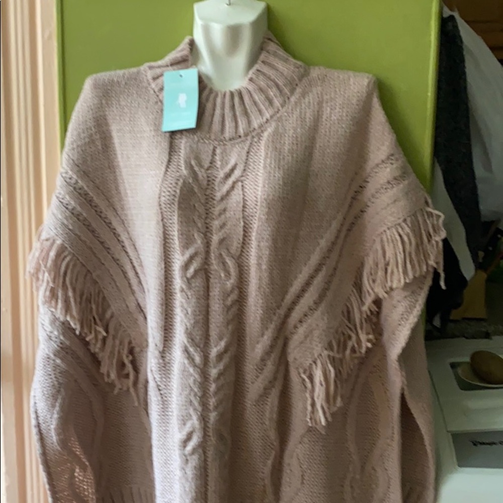 KUAI women’s sweater.